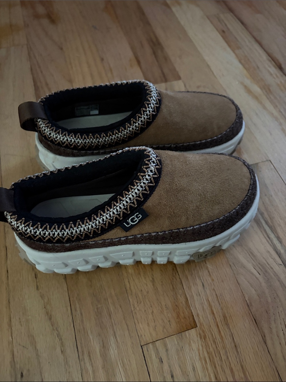 UGG women’s Chestnut Suede Slip-On Loafers with White Sole barely worn